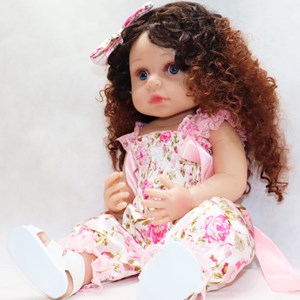 عروسک سیلیکونی دختر بچه 50 سانتی سخنگو با گل سر صورتی_عروسک